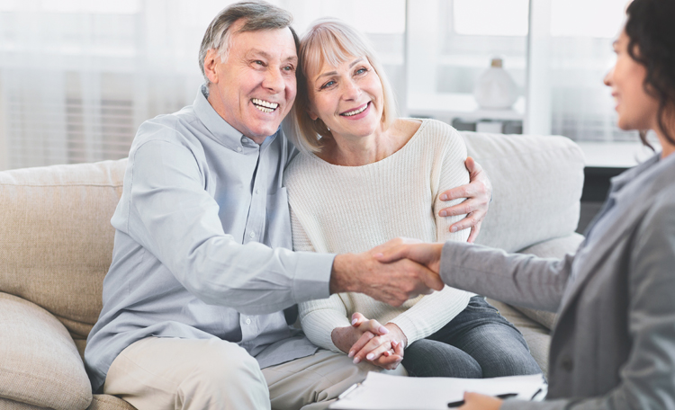 couple speaking with agent